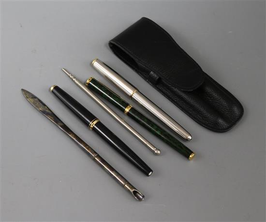 A Mont Blanc pen, two other pens including Parker, a silver dip pen and a metal pen.